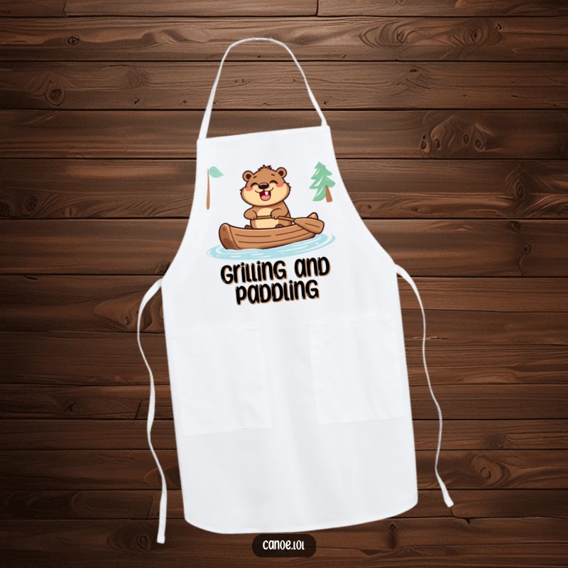 Funny apron featuring an excited beaver paddling a canoe with a wide grin, designed to bring outdoor humor to the kitchen.