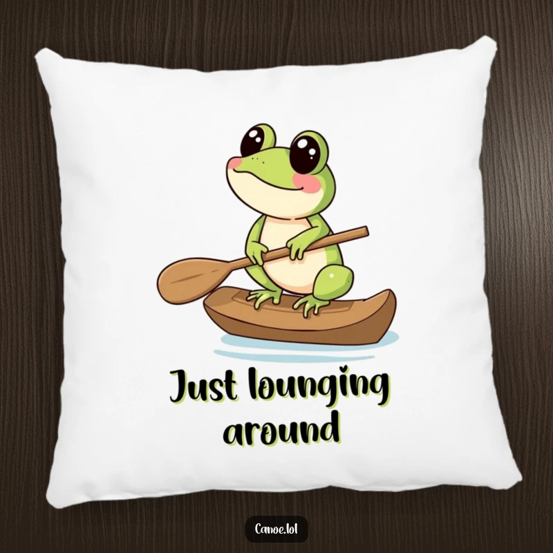 Funny Pillow featuring a cheerful frog balancing on the end of a canoe paddle, adding a humorous touch.