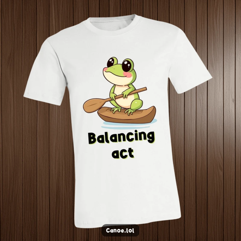 Funny T-Shirt showcasing a happy frog balancing perfectly on the end of a canoe paddle, embodying skill.