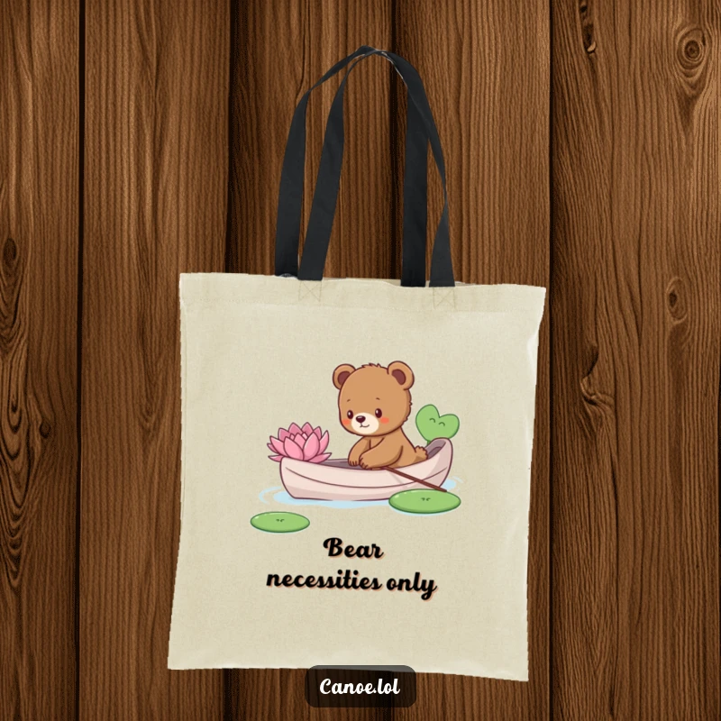 Funny curious bear cub in a canoe, reaching for a lily pad, a humorous and practical tote bag.